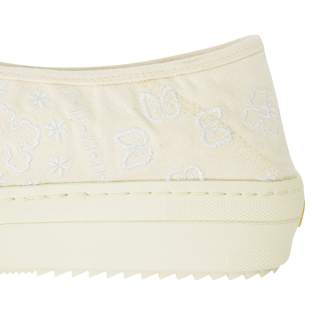 White Slip On Sneakers